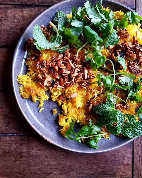  Alison Roman's Buttered Turmeric Rice w/ Crushed Almonds & Herbs